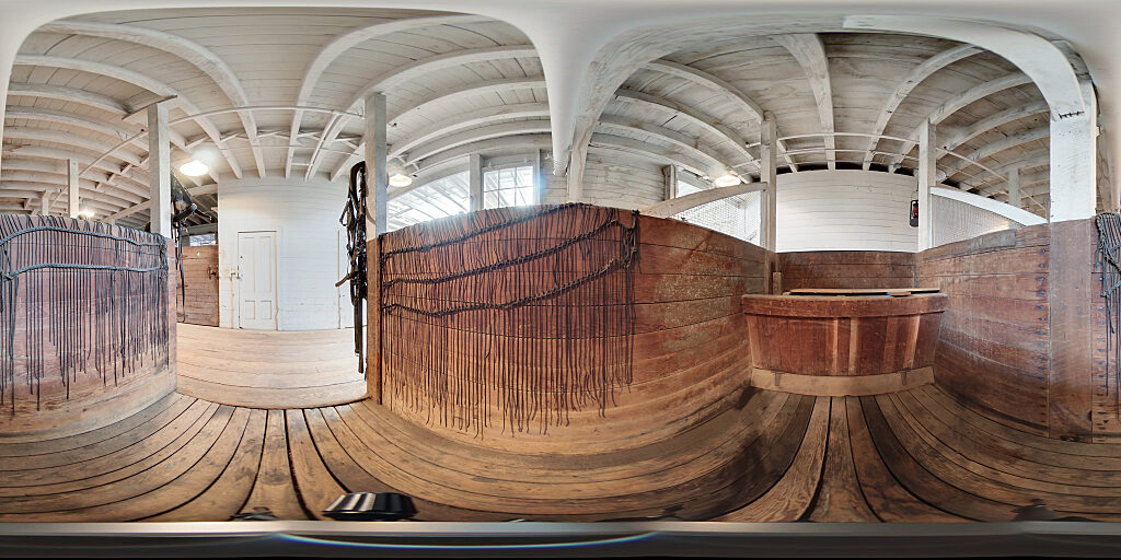 Panoramic view of Barn empty stalls.