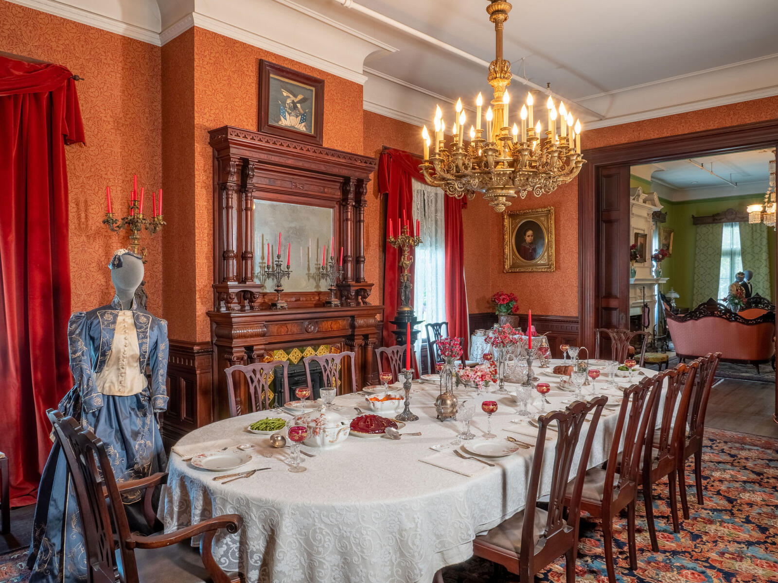 Dining room table and chairs with female mannequin