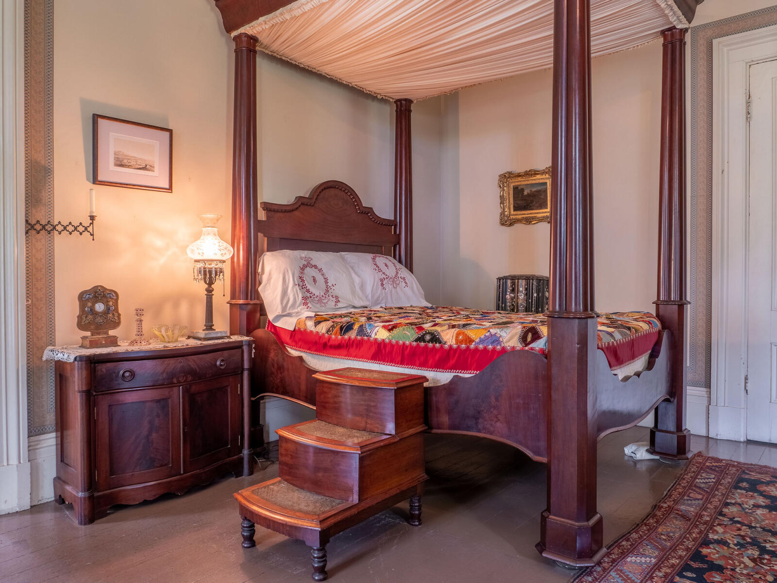Four-poster canopy bed in Master Bedroom with commode steps